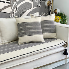 Set piecera trama negro tejida con borlas 210x70cm + 2 fundas cojín 50x50cm + cuenta decorativa gratis