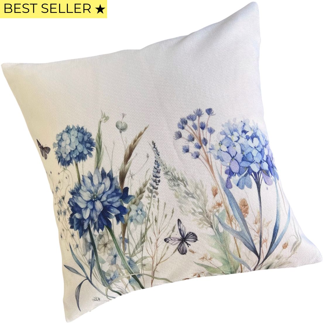 Cojín decorativo con flores azules para sofá o cama
