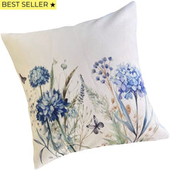 Cojín decorativo con flores azules para sofá o cama